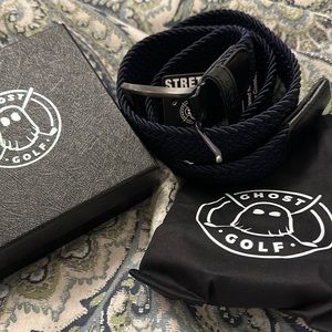 NWT. Ghost golf Navy wolf belt. Size 32. Stretch fit.